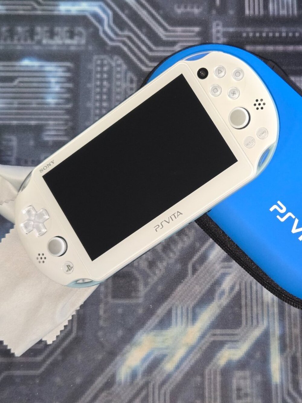 PlayStation PS Vita Slim 2000 Console: 128gb Loaded Game Bundle (Light Blue)